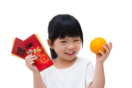可爱的小女孩拿着橘子和红包图片