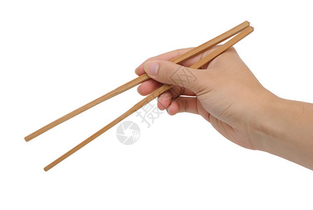 在白色背景下用竹筷子对背景图片