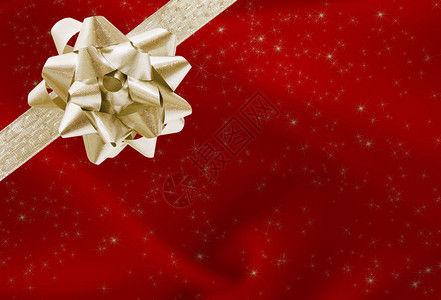红圣诞礼物带金弓和丝图片