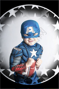 年轻男孩穿着美国服装船长在星际背景图片