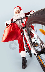 照片惊喜圣诞老人和骑自行图片