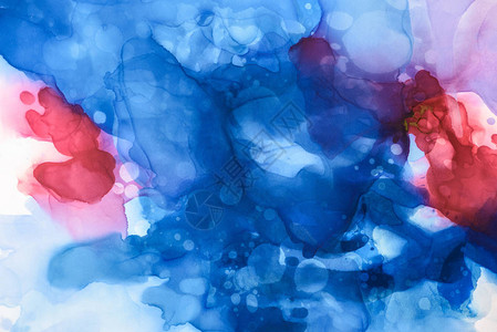美丽的蓝色红色和紫色的酒精墨水喷洒图片