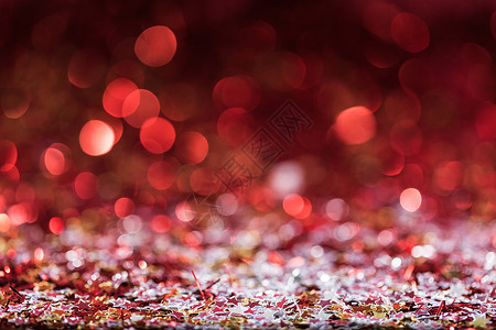 圣诞背景与红色明亮的五彩纸屑星图片
