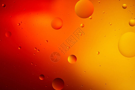 混合水和石油的抽象大型橙色和红色背景背景图片
