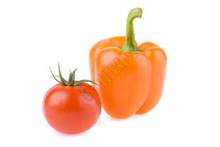 白色背景上的番茄和橙色甜椒图片