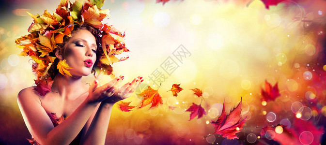 秋季到来吹红魔法叶子的模特图片