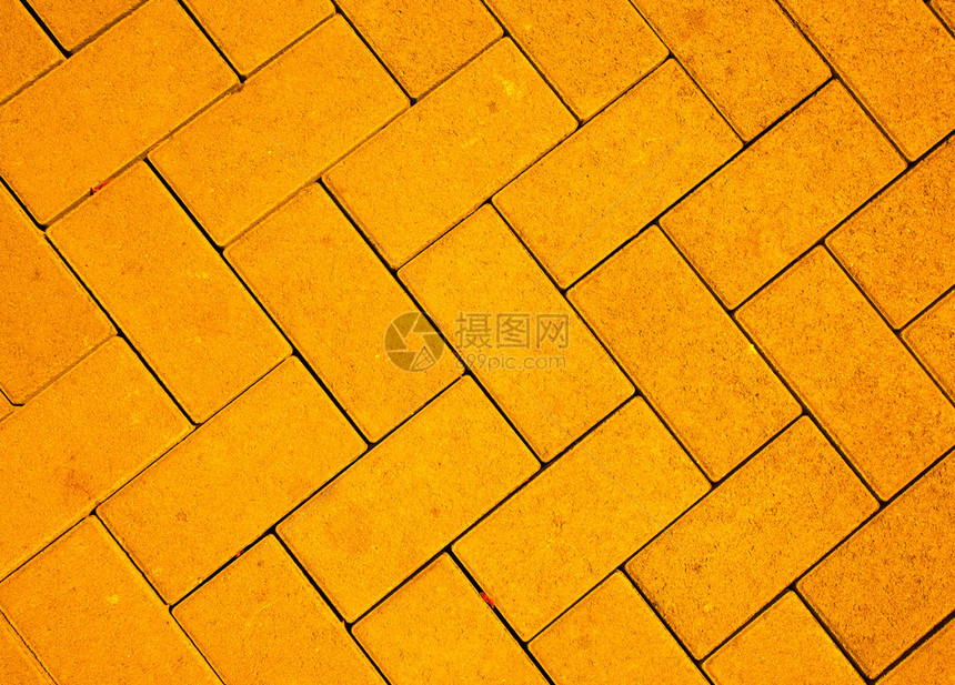 用黄色浇注混凝土块制成的路面图案图片