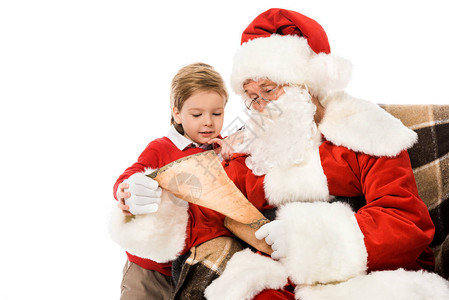 圣诞老人和可爱的孩子一起读信图片