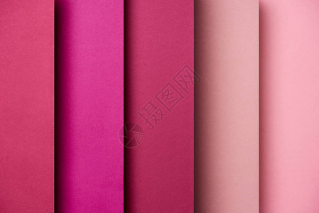 粉红色和洋红色调的重叠纸张图案图片