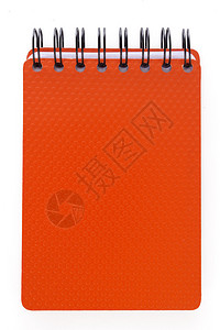 一个螺旋笔记本的橙色封面图片