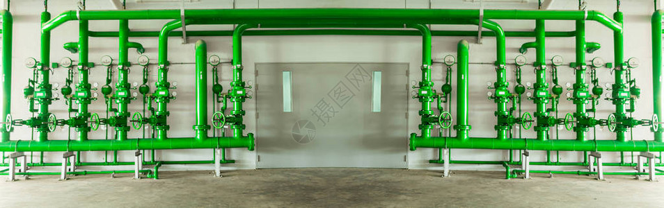 工业建筑或商业建筑中的绿色水管阀水管系统控图片