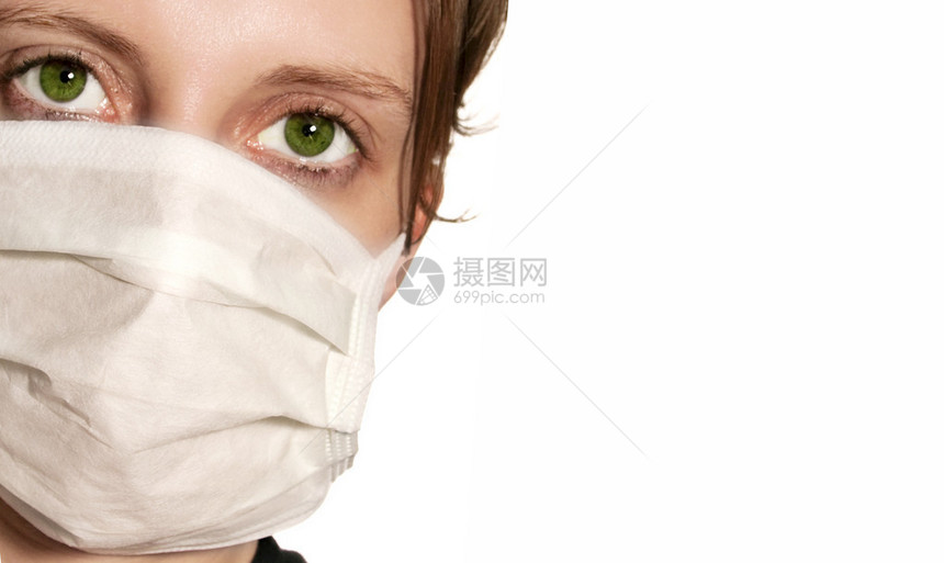 身戴防流感医疗面具的绿眼睛图片