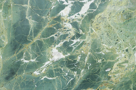 绿色大理石和光静脉纹理本底或瓷砖的图片