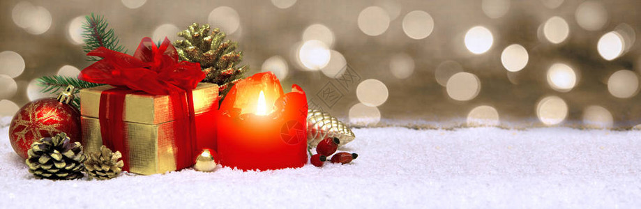 红蜡烛和金色礼物盒圣诞节舞会和装饰圣诞图片