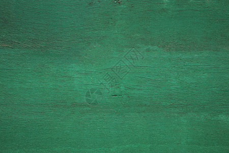 老绿漆成风化木质纹理的特写镜头图片