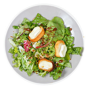 绿色沙拉顶部的绿色拉视图和白背景孤立的餐图片