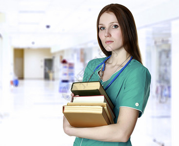 餐饮店员工手册在医院或医学院的走廊里有书的漂背景