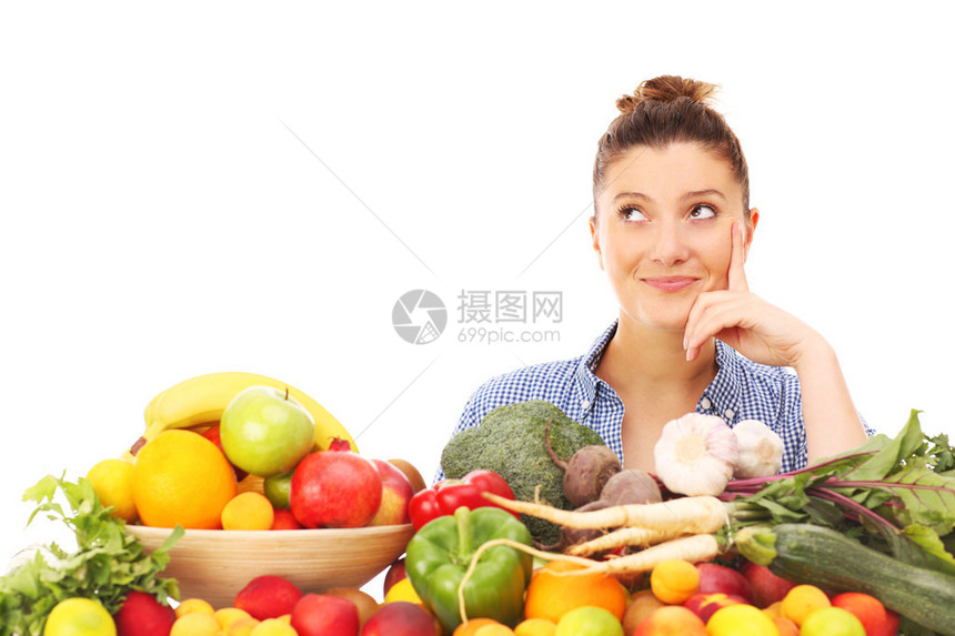 蔬果堆里的幸福女人图片