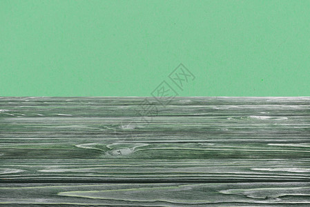 绿色背景上的深绿色木地板模图片
