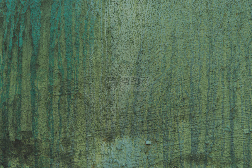 老划伤的绿色墙壁纹理背景图片