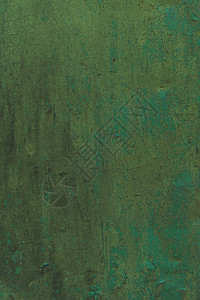 划伤的绿色墙壁纹理背景图片