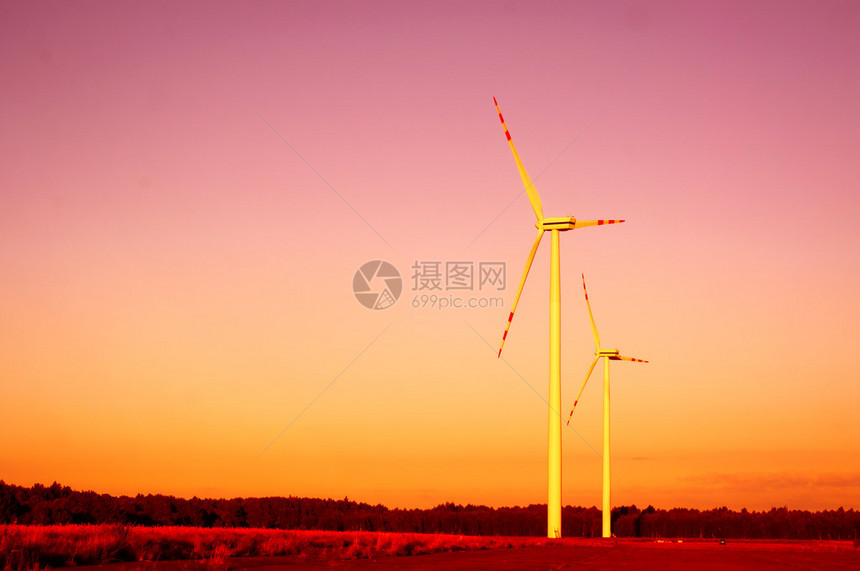 黄昏时的风力涡轮机图像图片