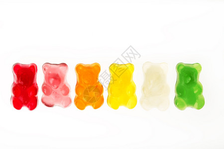 童年和果冻熊糖果在白色背景下被隔离图片