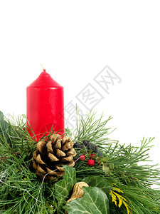 圣诞花圈用红蜡烛从新鲜的树枝和图片