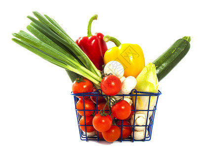 购物篮满的蔬菜被白图片