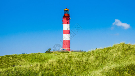 德国SchleswigHolstein北海Amrum岛传统灯塔的图片