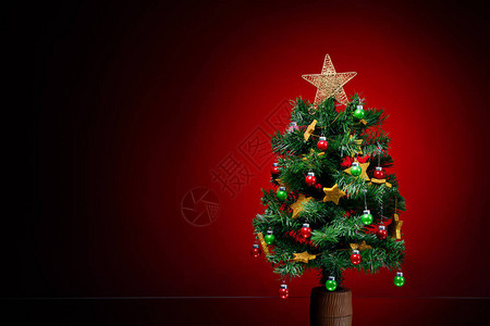 在红色背景的欢乐圣诞树图片