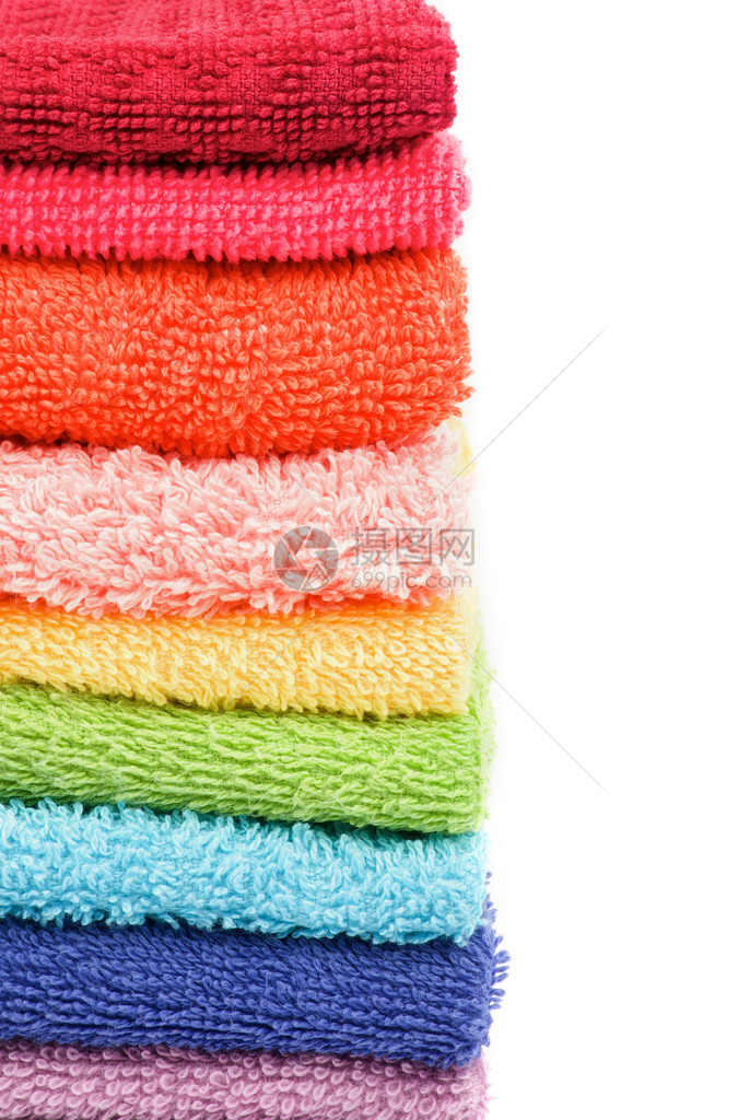 堆叠的彩虹色毛巾框架以图片
