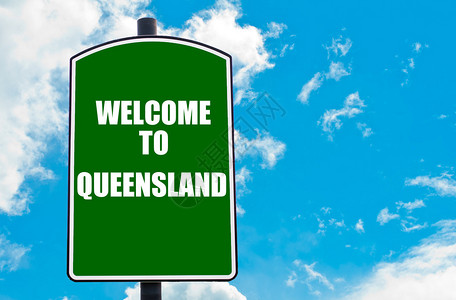 带有问候语的绿色路标欢迎来到昆士兰背景图片