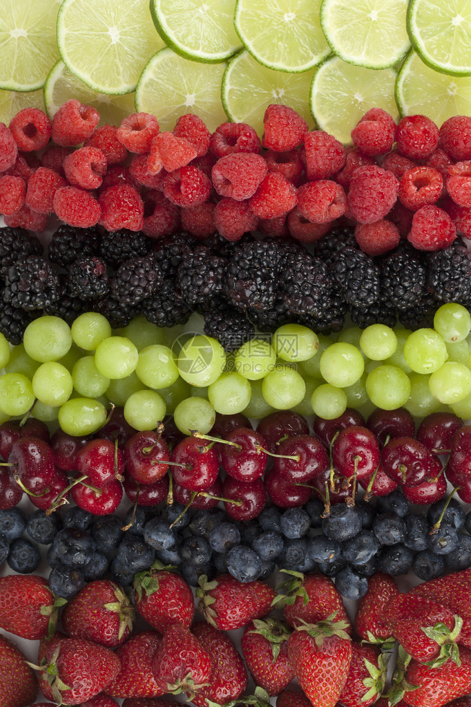 一层什锦新鲜水果的垂直图像图片