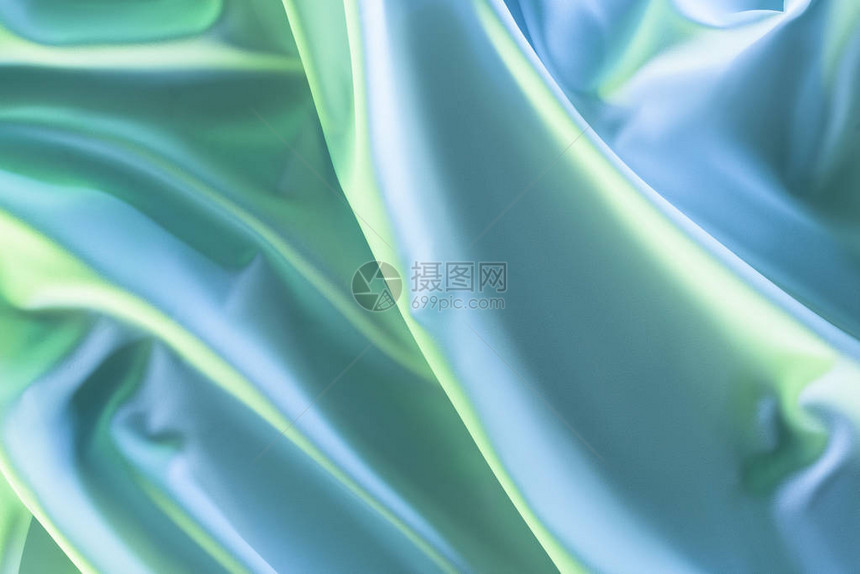 以绿色和蓝色软绸布为背景的色调图片图片