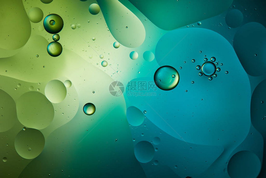 蓝色和绿色混合水和油的抽象背景图片