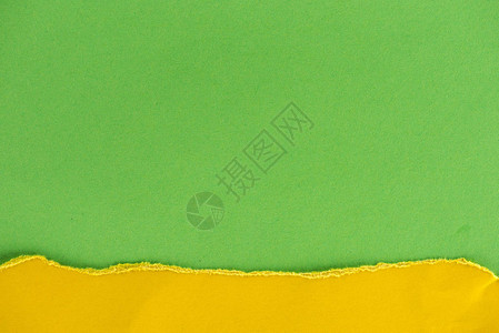 背景绿色和黄色纸层的特写镜头背景图片
