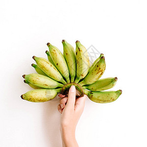 手握着一帮孤立的香蕉图片