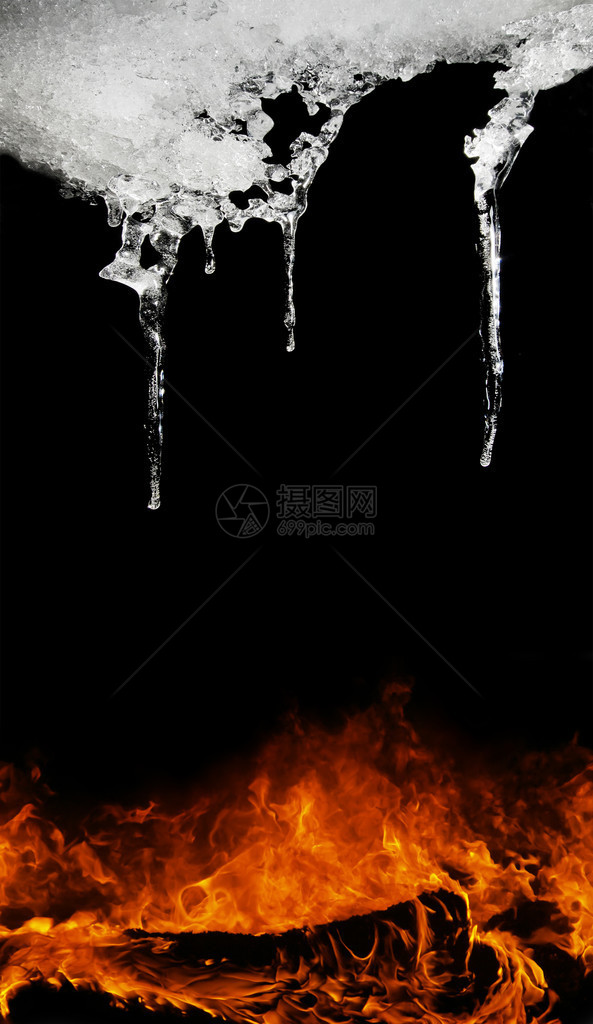 黑色背景上的火和冰柱图片