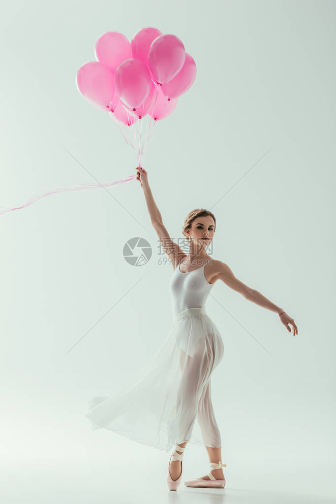 优雅的芭蕾舞芭蕾舞团带有粉色气球图片