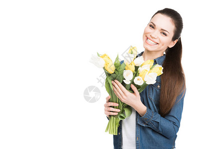 为国际妇女节配有一束郁金香花的幸福女人图片