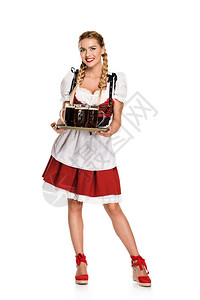 穿着传统的德国服装的美丽女服务员图片