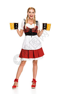 穿着传统的德国服装的快乐女服务员在OktoberFes图片