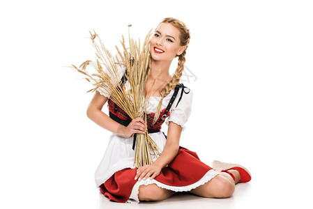 穿着传统德国服装的美丽笑脸女孩图片