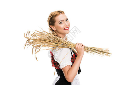 带着小麦的德国传统服装中微笑图片