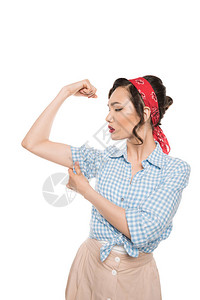 强健的铁针结起来的女人显示肌肉图片