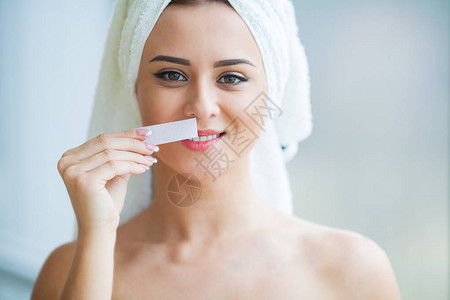 脱毛蜡从女人身上去除糖毛蜡脱毛水疗程序程序美容图片