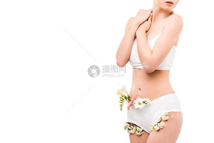 穿着内裤的鲜花孤立在白色和亲密照料概念上的女图片
