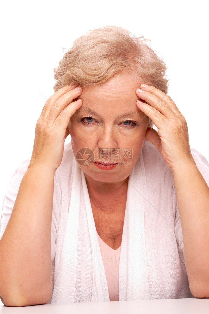 生病的年老妇女摸头和看图片