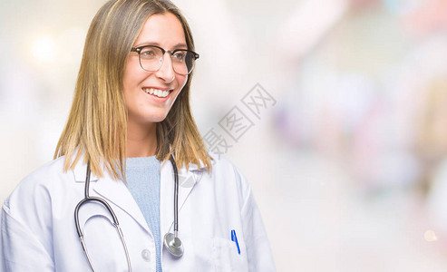 年轻漂亮的女医生戴着耳机图片